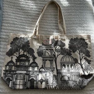 Sézane black cotton on a cream background unlined canvas tote.